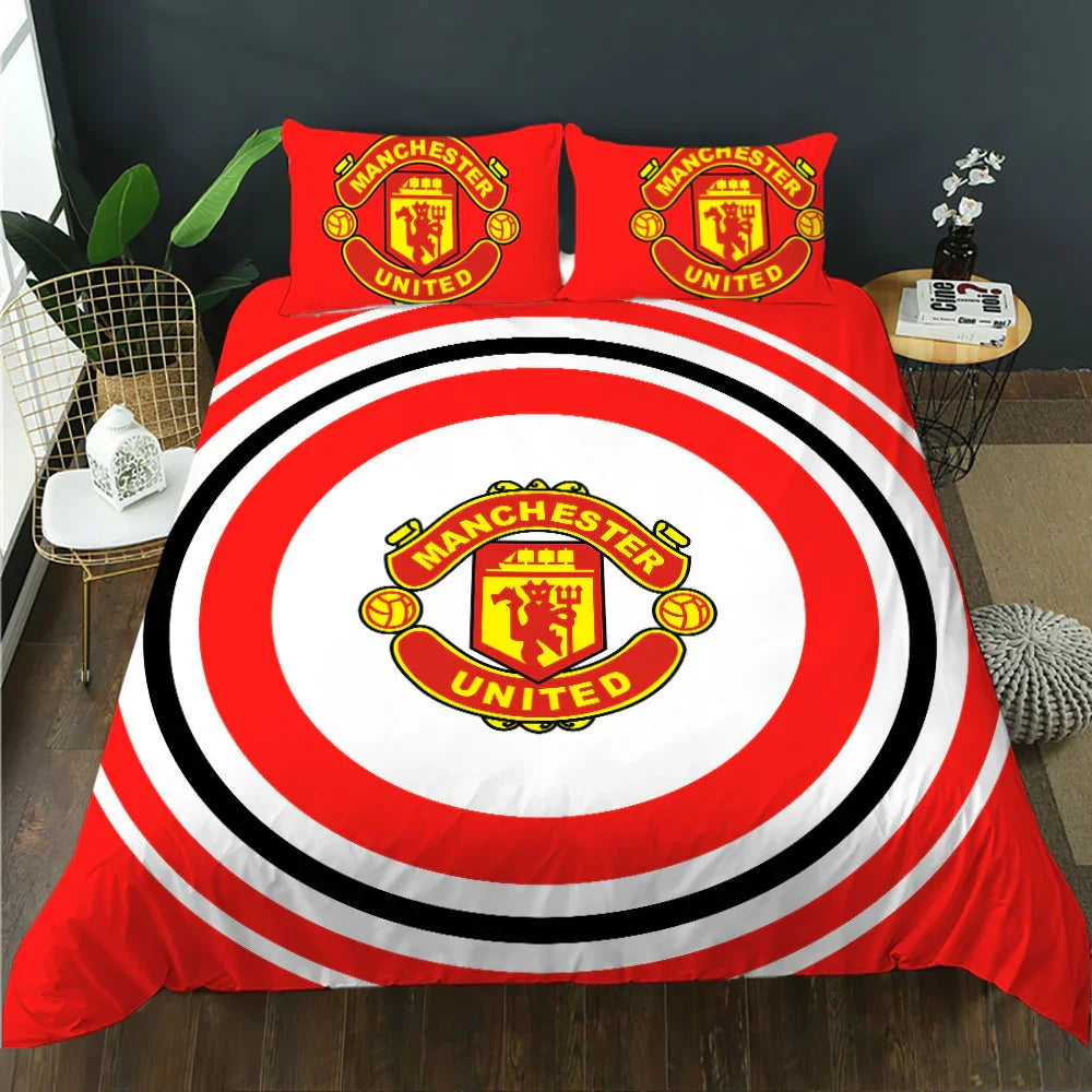 Manchester United themed bedding set with bold red, white, and black stripes and team crest design