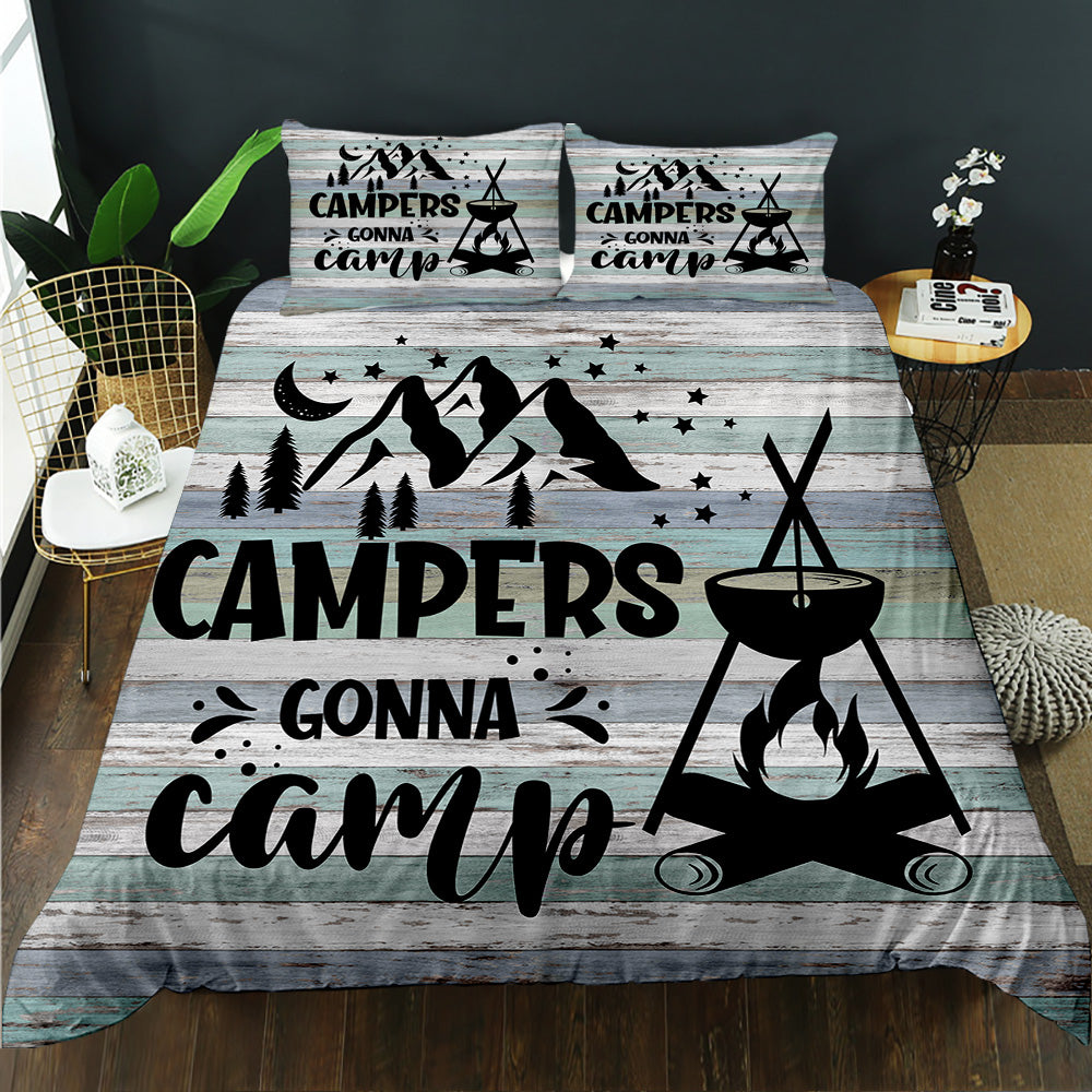 Bedding set with 'Campers Gonna Camp' design on a bed in a room setting.