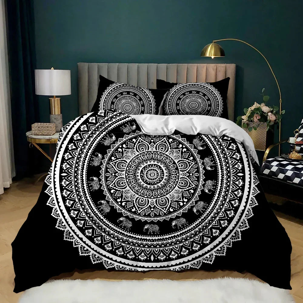 Black and white mandala quilt cover set with elephant details, styled on bed with modern decor