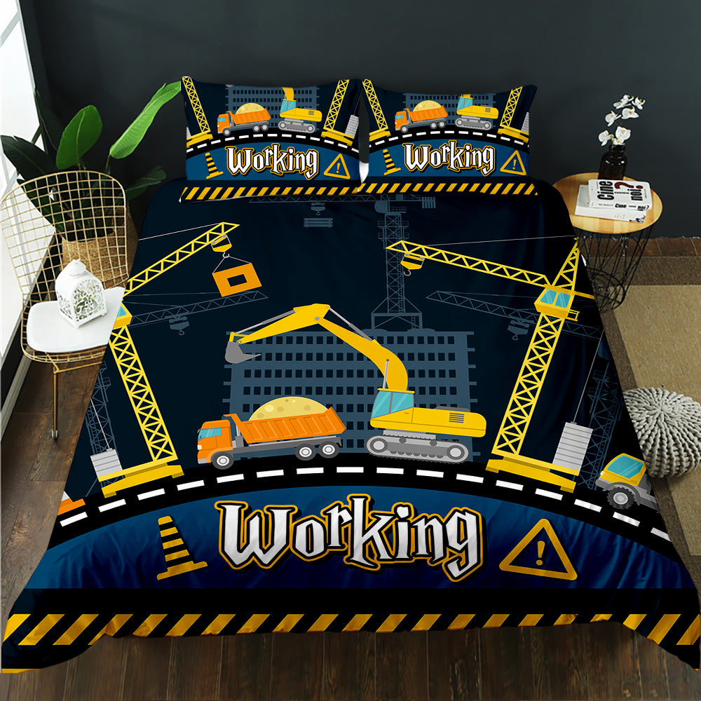 Cranes, excavator and dump truck on a city road with Working text on a navy kids quilt cover set