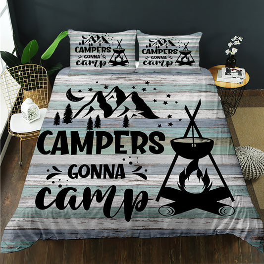 Bedding set with 'Campers Gonna Camp' design on a bed in a room setting.