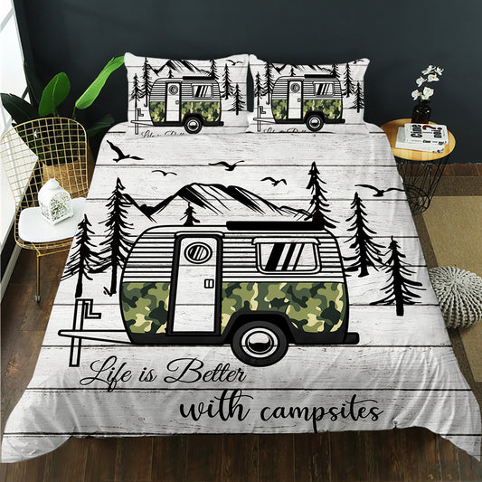 Camper-themed bedding set with trees and 'Life is Better with Campsites' text on a bed.