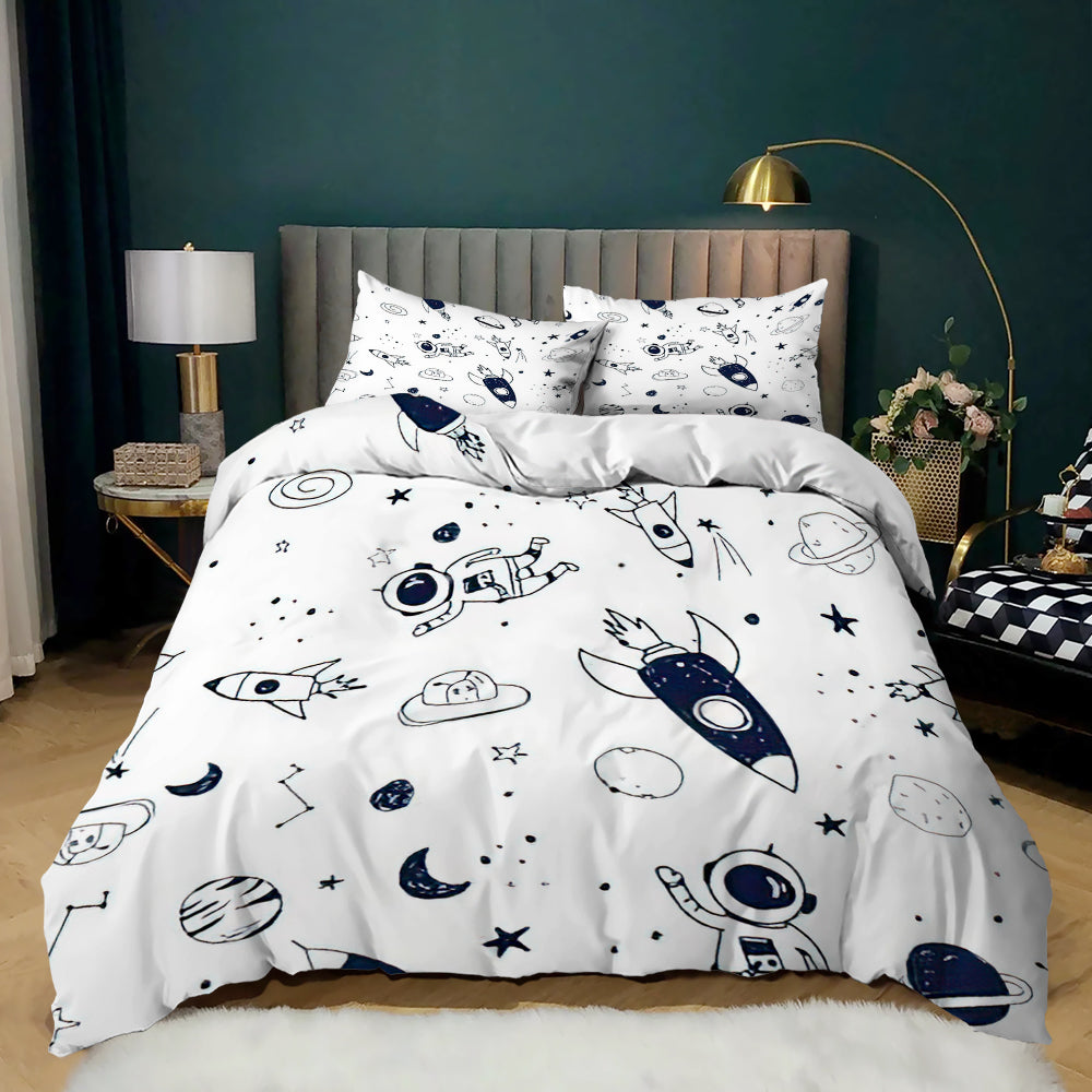 Navy line-drawn astronauts, rockets and planets on a white kids quilt cover set